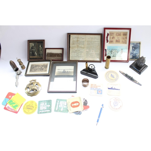 69 - Selection of militaria and misc. collectable items including framed postcards, hand grenade casting ... 
