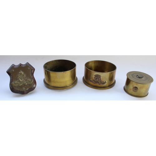 77 - Two brass ashtrays formed from shell case bases, one with Royal Artillery crest, a Royal Artillery s... 