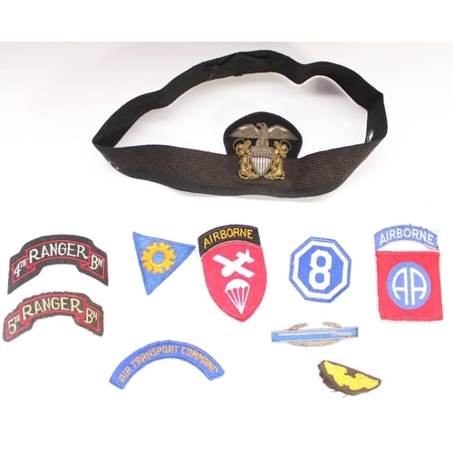 55 - Small selection of WW2 era US military cloth and bullion patches and badges, including a US Navy Off... 