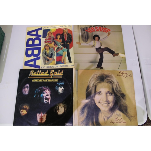 391 - Selection of various LPs inc. Abba, Wings, Rolling Stones, Simon and Garfunkel, Meatloaf etc