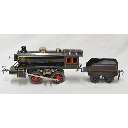 506 - Three boxes containing a collection of vintage railway accessories, track, locomotive and tender, ro... 