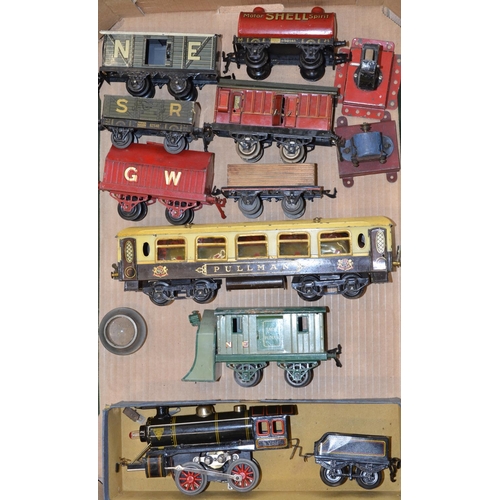 506 - Three boxes containing a collection of vintage railway accessories, track, locomotive and tender, ro... 