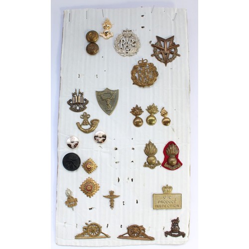 29 - Selection of British military regimental cap badges, buttons and collar badges mounted and card plus... 