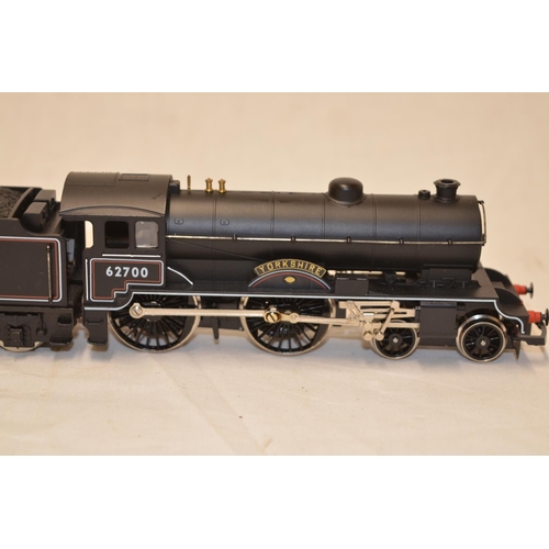 596C - Two boxed Hornby OO gauge railway trains, railway engines, including  62700 Yorkshire, Lima LNER tan... 