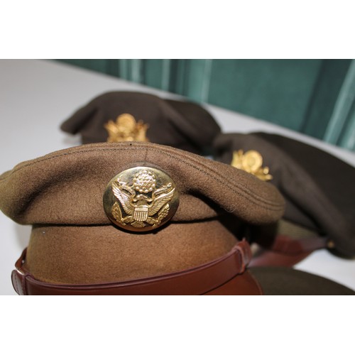 160 - WW2 period Four Officers peak caps chocolate and olive green with USAF insignia