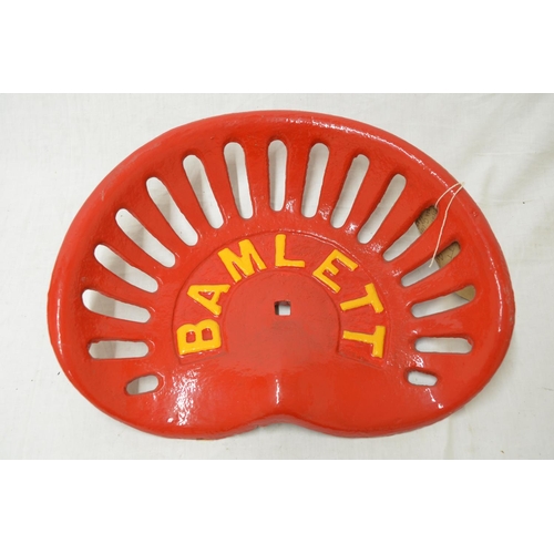 553 - Bamlett red painted cast iron grass cutters seat W41.5cm