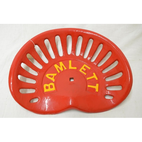 554 - Bamlett red painted cast iron grass cutters seat W41.5cm