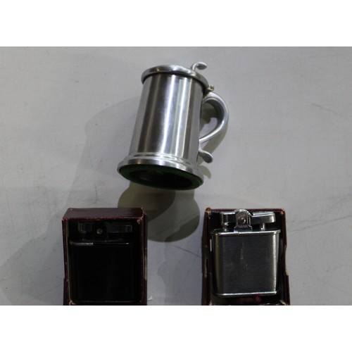 225 - Novelty Dunhill lighter in the form of a pewter tankard, boxed Ronson chrome lighter and a boxed Ron... 