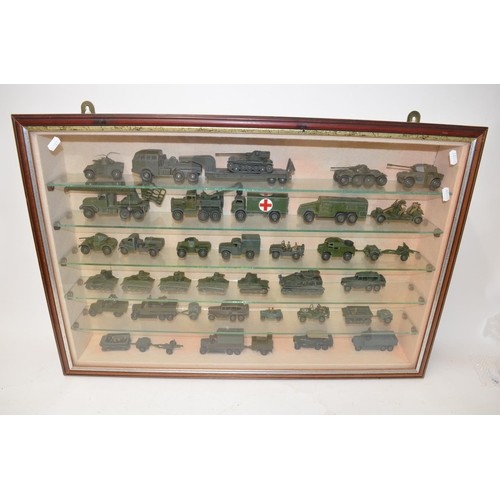 629B - Collection of Dinky armour models (and some Solido) with a wall mounted display case
