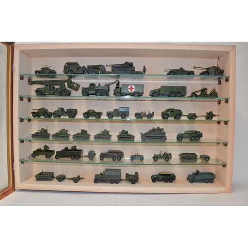 629B - Collection of Dinky armour models (and some Solido) with a wall mounted display case