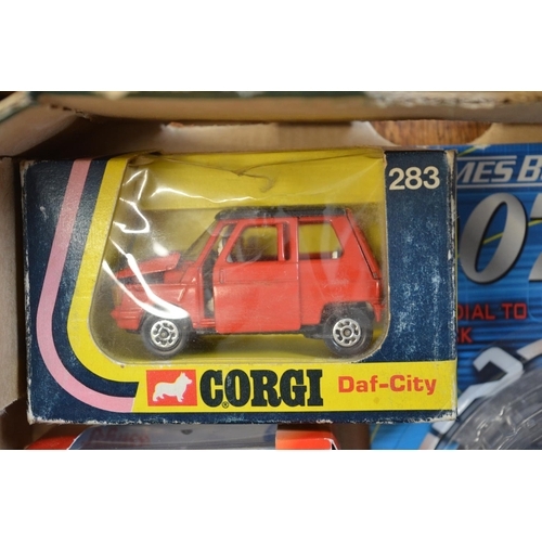 693a - Collection of die cast Corgi James Bond models, modern reproduction dinky toys and catalogue, 3 stat... 