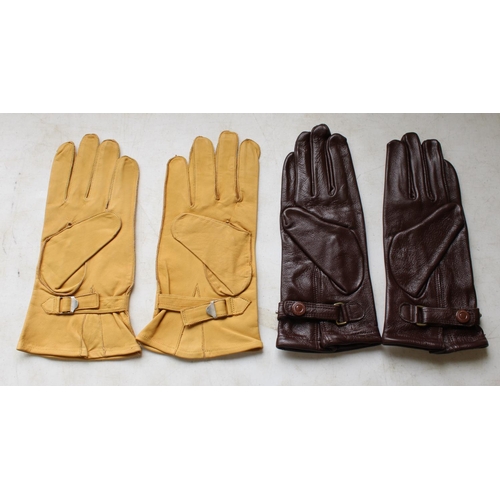 179 - Two pairs of lined aviation gloves, in brown leather with press stud fastening, goatskin tan gloves ... 