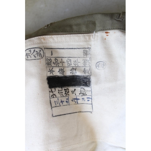 218 - Japanese military tunic, no insignia, label inside, with brass buttons, breast pockets, sergeant maj... 