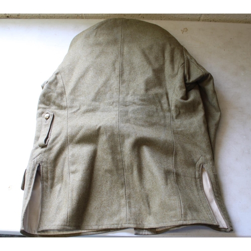 218 - Japanese military tunic, no insignia, label inside, with brass buttons, breast pockets, sergeant maj... 