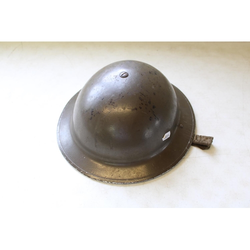 100A - WWII Brodie steel helmet, with liner and chin strap in infantry colours