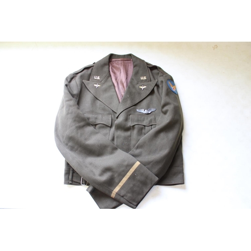 110 - WWII officers 8AAF four pocket jacket, size 38, named to Officer Flood, with original insignia and s... 