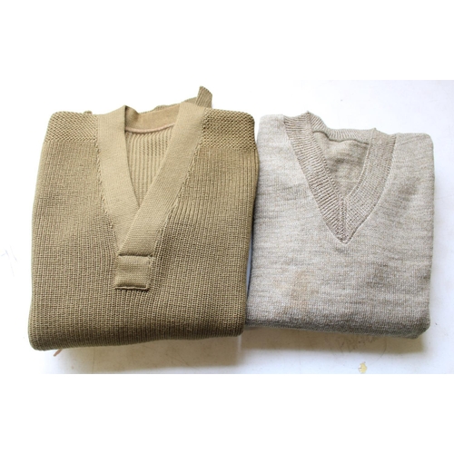 119 - Gordon & Co woolly jumper with military arrow on label dated 1944 and heavy duty military V neck jum... 