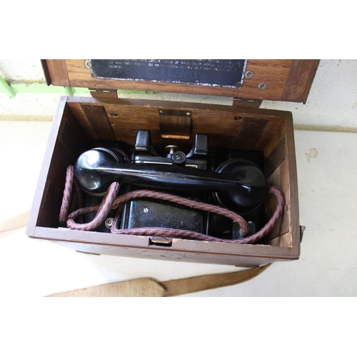 207 - Boxed field telephone set 