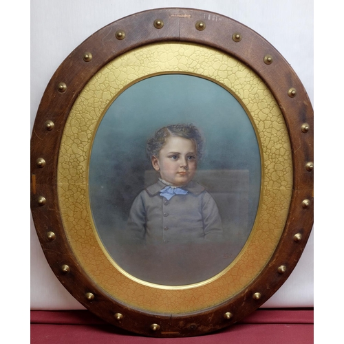 516 - English School (C20th): Portrait of a young boy, half length in grey frock coat, over painted photog... 