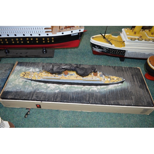 392 - Collection of pre-made ship models, amateur built ship models mostly in wood, including Titanic, Cut... 