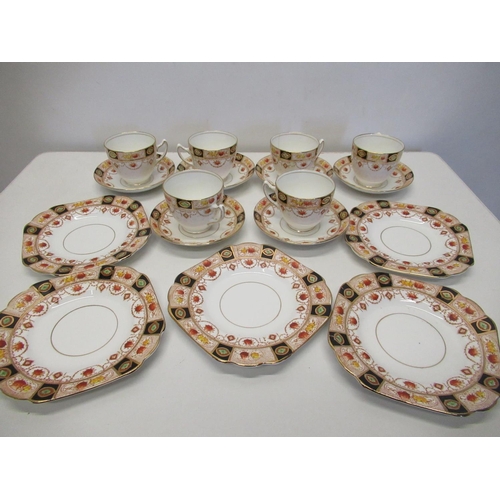 219 - Early 20th C Melba bone china 17 piece dinner service decorated in burnt orange a blue with gilt hig... 