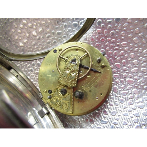 287 - Victorian silver open faced key wound pocket watch, hinged cased back and bezel with bright cut deco... 