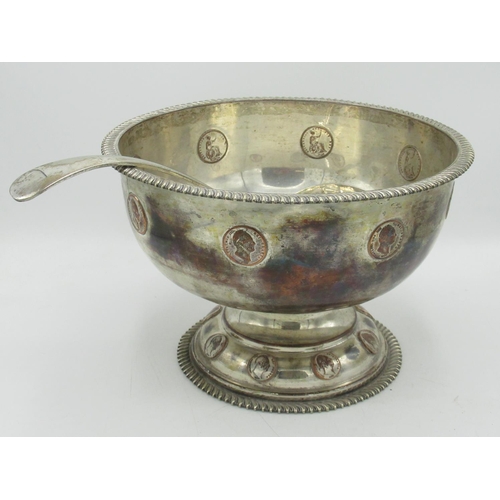 291 - Early C20th silver plated punch bowl, with gadrooned edge, set with coins, circular pedestal foot wi... 