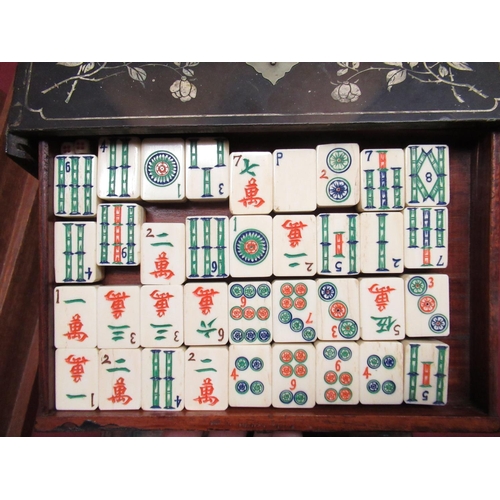 342 - Mahjong game with five trays in a hand painted case with four stands, with printed instructions and ... 