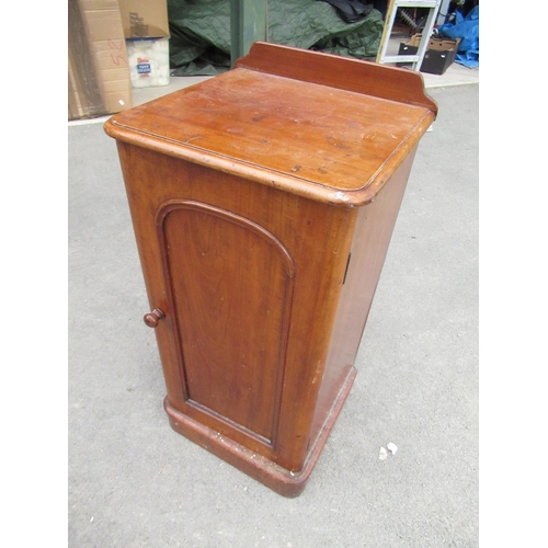 556 - Victorian mahogany bedside cupboard with raised back, arched panel door on plinth base, W39cm D38cm ... 