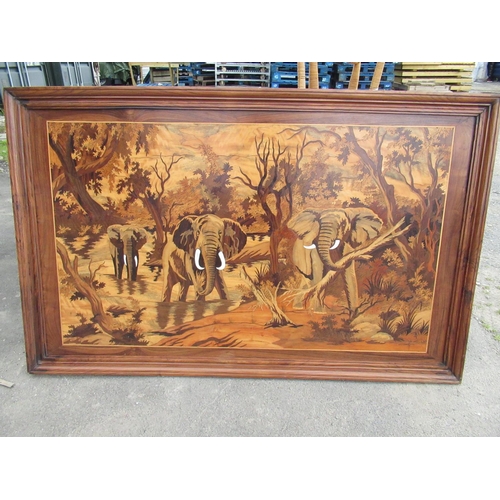 558 - C20th marquetry and faux ivory picture of three African elephants in the jungle, W163cm H103.5cm