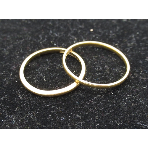 35 - Two hallmarked 22ct yellow gold wedding bands, size L1/2 and P1/2, 2.9g