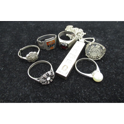 39 - Hallmarked sterling silver ingot pendant on a sterling silver chain, another sterling silver chain a... 