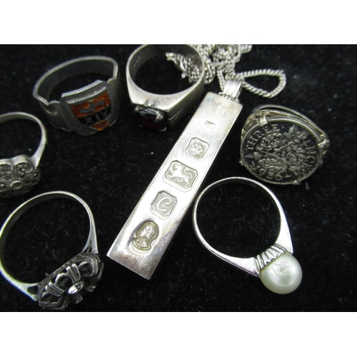 39 - Hallmarked sterling silver ingot pendant on a sterling silver chain, another sterling silver chain a... 