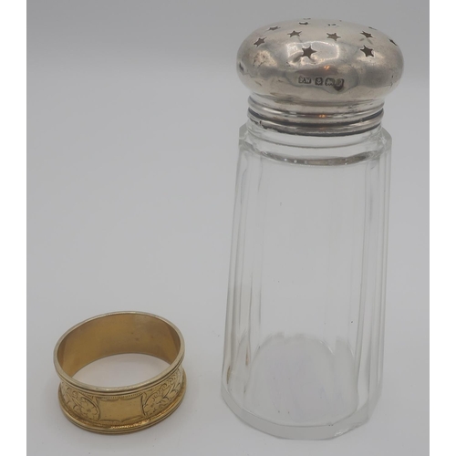 676 - Victorian silver gilt hallmarked napkin ring with scroll engraved detail, Birmingham 1899 and a glas... 