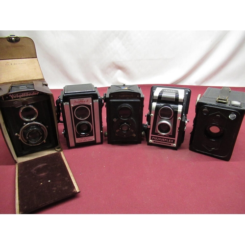 165 - Box of various box cameras including Kodak, Ross Ensign, Voigtlander etc.