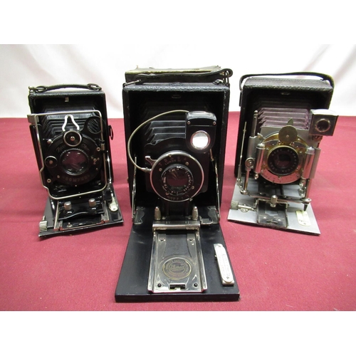 166 - Three quarter plate folding cameras, including Cameo folding plate camera with original box, Zeiss I... 