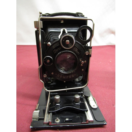 166 - Three quarter plate folding cameras, including Cameo folding plate camera with original box, Zeiss I... 