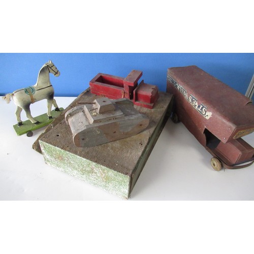 588 - Vintage toys; Small hand made push along wooden model of a dappled horse, a similar tank and lorry (... 