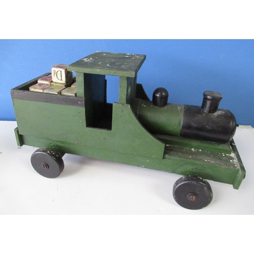 590 - Vintage green and black painted push along model of a steam engine, L52cm H27cm, and a collection of... 