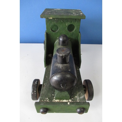 590 - Vintage green and black painted push along model of a steam engine, L52cm H27cm, and a collection of... 