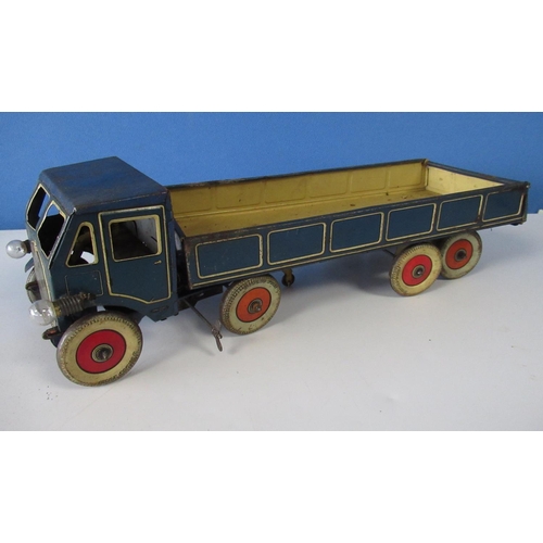 576 - Mettoy blue tinplate clockwork lorry and trailer with cream detail, red wheels with white tyres, lat... 