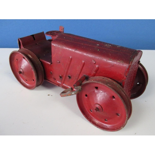 582 - Tri-ang No2 red tinplate clockwork tractor, possible repaint, missing tracks and driver, L21cm