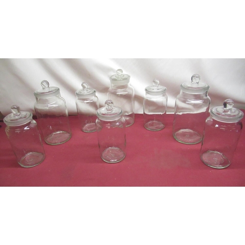 407 - 3 large glass storage jars with lids and 5 medium glass storage jars with lids