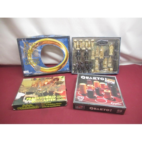 416 - German building block set, Quattro game, Lord of the Ring bronze chess set (3)