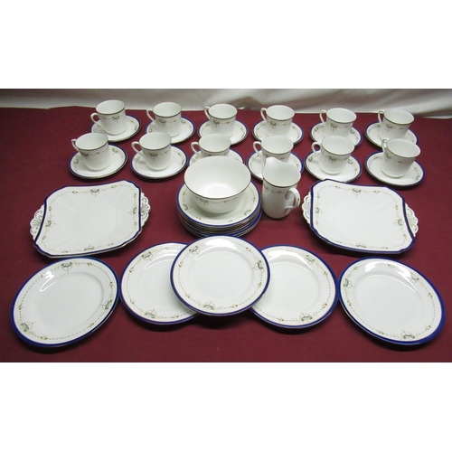 114 - Shelley 11422 pattern part tea service decorated with floral sprays with blue and gilt borders, incl... 