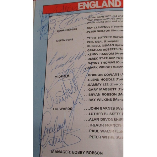 466 - Six England football programmes from the 1970s & 80s signed by Bobby Robson,George Best, Gordon Bank... 