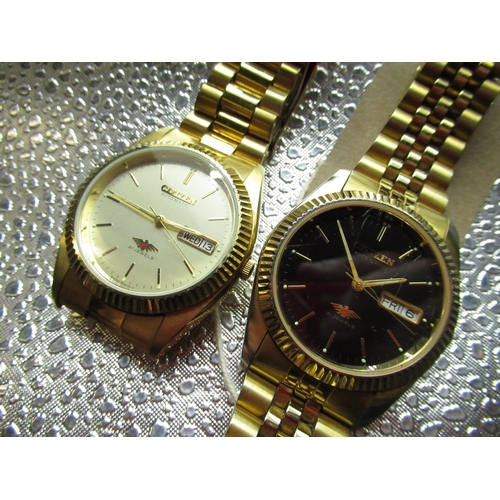 82 - Two Citizen automatic 21 jewel wristwatches with day/date case back numbered 071857 and 50801976 (2)... 