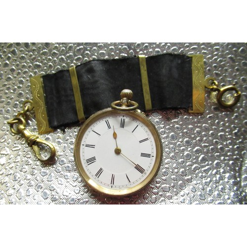 85 - Continental 14k gold top wind ladies fob watch, white enamel Roman dial with gilt hands, engraved ca... 