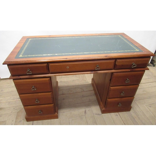 639 - 20th Century pine kneehole twin pedestal desk, with gilt tooled inset writing top three frieze and s... 