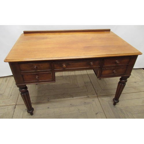 641 - 19th century mahogany kneehole writing table, five cockbeaded drawers with turned wooden handles, on... 